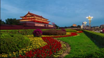 stock-footage-from-day-to-night-the-splendid-tian-anmen-tower-and-the-colorful-flower-bed-in-beijing-china